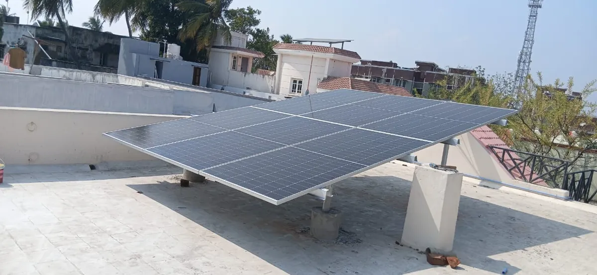 Rooftop solar installed by Surya's Solar on a raised galvanized structure